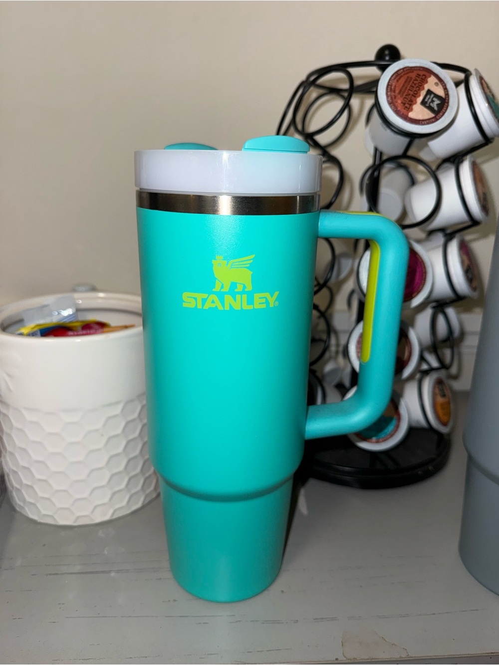 Stanley Turquoise Travel Mug with Yellow Logo and Handle Accent
